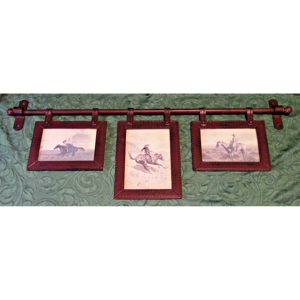 SOLD!!!Three Western-themed pictures on wrought-iron hanging rod